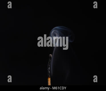 Smoky curls. Black background Stock Photo