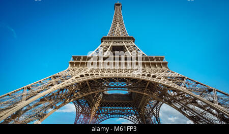 The Eiffel Tower worms eye view over blue sky Stock Photo