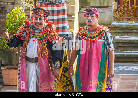 Balinese locals performing Barong, a mythical lion-like creature at a traditional ceremony in Bali. Stock Photo