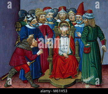 After dressing Jesus in a purple robe, the soldiers wove thorn branches into a crown and put it on his head and mock him. Codex of Predis, 1476. Royal Library. Turin. Italy. Stock Photo