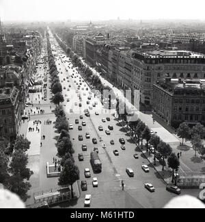 1950s, Paris, France, historical, overhead picture of the city and of a long, straight, wide tree-lined boulevard, the famous Avenue des Champs Elysees, perhaps the most iconic street in the world. Stock Photo