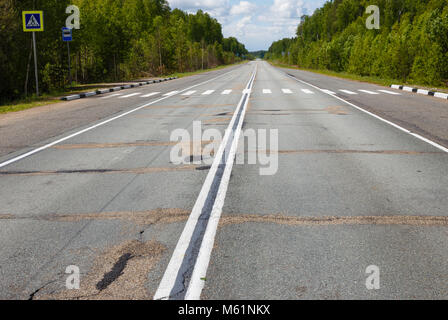 white double continuous strip on the asphalt Stock Photo