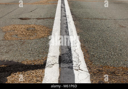 Asphalt road with marking lines white stripes. Stock Photo