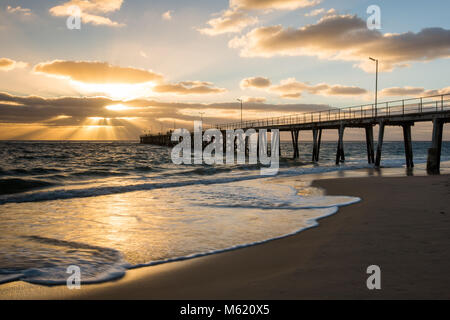 Sunset over the Jetty at Port Noarlunga South Australia Australia on the 25th February 2018. Stock Photo