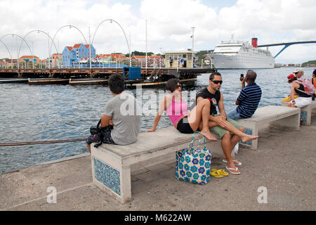 People watching swiveling Queen Emma bridge, opens for ship traffic, Otrobanda, Otrobanda, Willemstad, Curacao, Netherlands Antilles, Caribbean Stock Photo