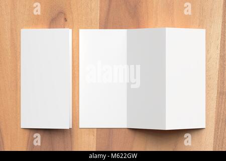 Thrifold - Three fold brochure mock up on wooden background. 3d illustrating Stock Photo