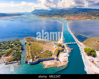 Castle Santa Maura and the famous floating swing bridge in Lefkada island Greece. Lefkada City visible in the background Stock Photo