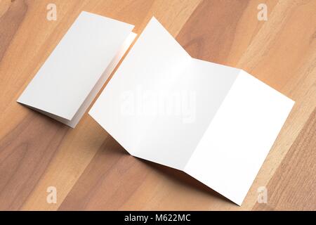 Thrifold - Three fold brochure mock up on wooden background. 3d illustrating Stock Photo