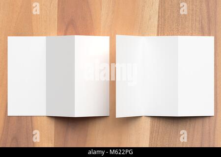 Thrifold - Three fold brochure mock up on wooden background. 3d illustrating Stock Photo