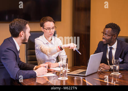 smart business partners using laptop at meeting Stock Photo