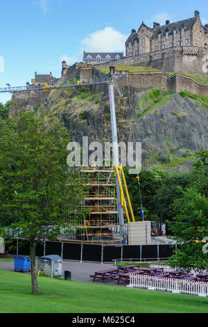 Scotland - Edinburgh. Edinburgh Castle with work repairing the fountain in Prince Street Gardens taking place in June 2017. Stock Photo