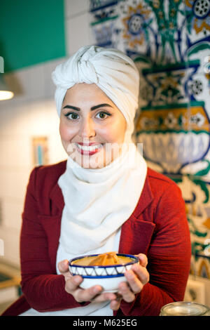 Malakeh Jazmati, Syrian TV-Star of a Cooking Show, cookbook author, refugee, living in exile in Berlin, Germany.