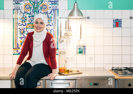 Malakeh Jazmati, Syrian TV-Star of a Cooking Show, cookbook author, refugee, living in exile in Berlin, Germany.