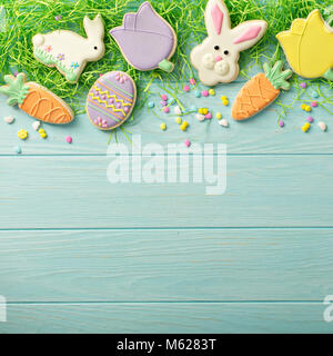 Easter cookies on blue table Stock Photo