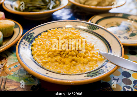 Creamed corn side dish on dinner table - USA Stock Photo