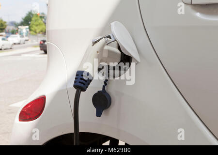 Power plug in electric car - USA Stock Photo