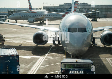 American Airlines passenger jet (Boeing 737 Next Gen) parked at Ronald Reagan Washington National Airport - Washington, DC USA Stock Photo