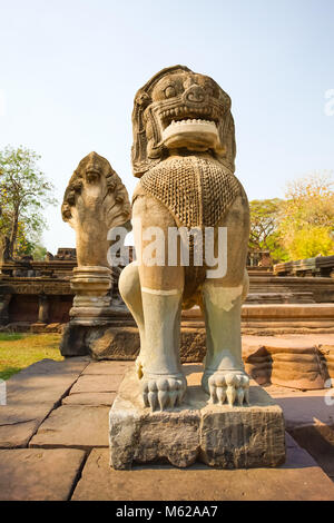 Lion or Singha and Naga sandstone statue in Prasat Hin Phimai of Phimai historical park. Stock Photo