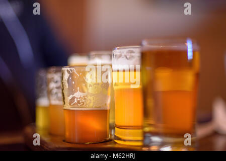 macro close up of a beer flight in sunlight at microbrewery in Chicago, Illinois Stock Photo