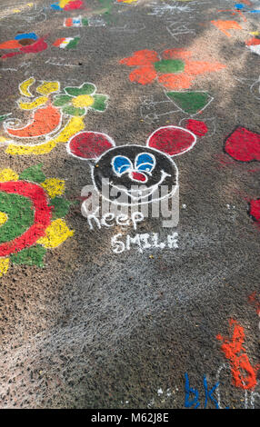 Kids drawings on asphalt road in Rajkot, Gujarat, India Stock Photo