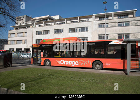 Royal Parade on Amada Way in Plymouth City Centre, Devon UK. A Orange Flash gas powered bus. Circa 2018 Stock Photo