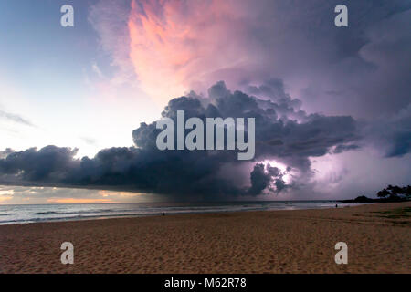 Ahungalla Beach, Sri Lanka, Asia - Thunder and lightning during sunset at the beach of Ahungalla Stock Photo