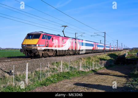 Virgin Trains East Coast 91112 speeds through Claypole with 1D20 15:33 London Kings Cross - Leeds. March 25th 2017. Stock Photo