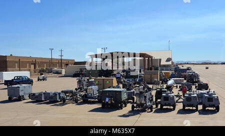 Loads of cargo are ready for transport during the Bushwhacker 18-02 Cactus Flag exercise at Davis-Monthan Air Force Base, Ariz., Feb. 9, 2018.  The Cactus Flag exercise is designed to ensure D-M is ready to provide attack aircraft to anywhere in the world. (U.S. Air Force Stock Photo