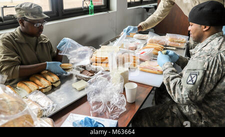 BOURNE, Mass., Soldiers from the Mess Section of F Co, 186th Brigade Support Battalion make over 320 lunches for the 1/101st Field Artillery Battalion at Joint Base Cape Cod on Feb. 10, 2018. (US Army Stock Photo