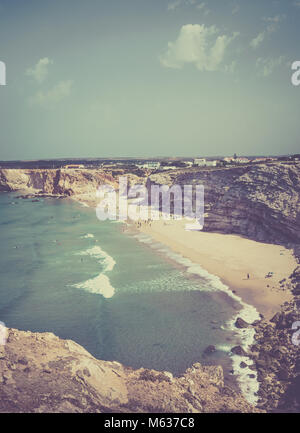 SAGRES, PORTUGAL - AUGUST 25, 2016: Aerial view of surfers on sandy beach near Sagres village in Portugal Stock Photo