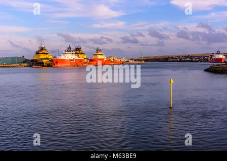 Oil industry rig support vessels in Montrose harbour, Scotalnd. Stock Photo