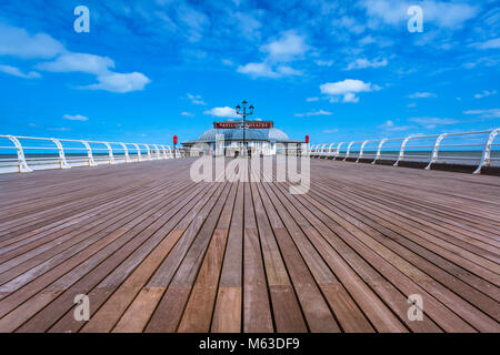 View along Cromer pier to the Pavilion theatre. Stock Photo