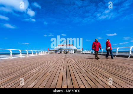 View along Cromer pier to the Pavilion theatre. Stock Photo