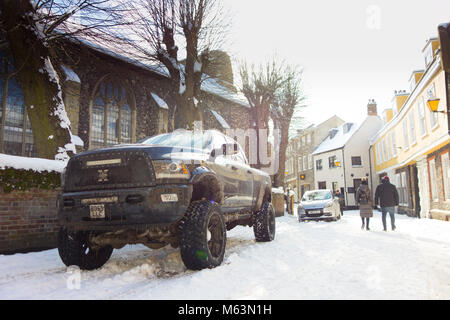 Norwich, Norfolk, UK. 28th February, 2018. Four-wheel drive, monster truck, pick up, parked in the snow on historic Elm Hill Norwich, after snow storm nicknamed the 'the Beast from the East' 28 February 2018 Credit: SPK/Alamy Live News Stock Photo