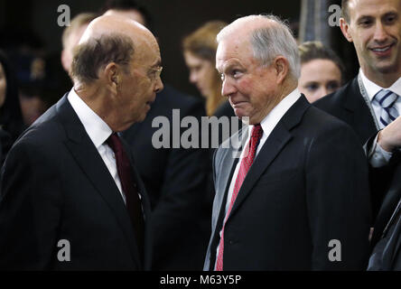 Washington, District of Columbia, USA. 28th Feb, 2018. United States Secretary of Commerce Wilbur Ross, left, and US Attorney General Jeff Sessions wait for the start of ceremonies as the late evangelist Billy Graham lies in honor in the Rotunda of the U.S. Capitol in Washington, U.S. February 28, 2018. Credit: Aaron P. Bernstein/Pool via CNP Credit: Aaron P. Bernstein/CNP/ZUMA Wire/Alamy Live News Stock Photo