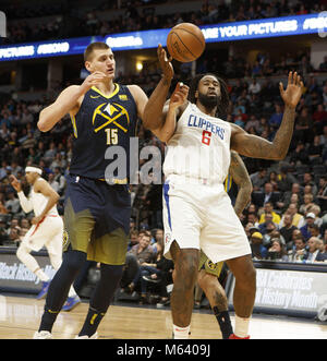 Denver, Colorado, USA. 27th Feb, 2018. Nuggets NIKOLA JOKIC, left, battles for control of the ball with Clippers DEANDRE JORDAN, right, during the 1st. Half at the Pepsi Center Tuesday night. The Nuggets lose to the Clippers 122-120. Credit: Hector Acevedo/ZUMA Wire/Alamy Live News Stock Photo