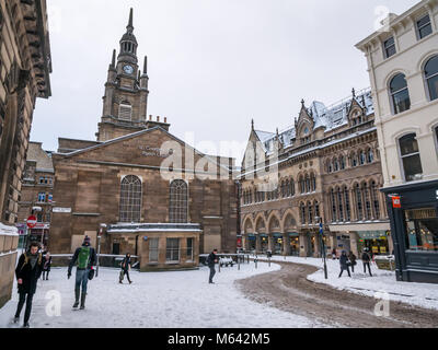 Glasgow, Scotland, United Kingdom, 28th February 2018.  UK Weather: Heavy snowfall from so-called arctic ‘Beast from the East’ at morning rush hour in the city centre. The streets quieter than usual, with people walking to work and no cars on the street. Only pedestrians in Nelson Mandela Place Stock Photo