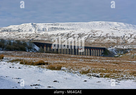Ribblehead Viaduct on the Settle to Carlisle rail line, in winter snow. Batty Moss, Ribblehead, North Yorkshire, England, United Kingdom, Europe. Stock Photo