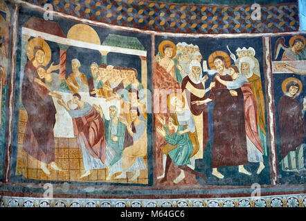 Interior Byzantine Romanesque style Christian frescoes of biblical scenes, Santissima Trinita di Saccargia, consecrated 1116 AD, Codrongianos, Sardini Stock Photo