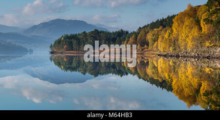 Early morning mist clearing over Loch Beinn a Mheadhoin in Glen Affric, Highland Region, Scotland, UK Stock Photo