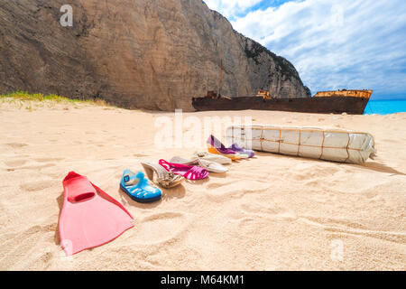 Trash left at Navagio beach, Zakynthos, Greece Stock Photo
