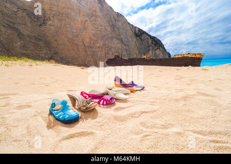 Trash left at Navagio beach, Zakynthos, Greece. Artistic view. Stock Photo