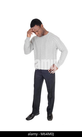An African American man standing isolated for white background with one hand on his forehead, looking sad, isolated for white background Stock Photo