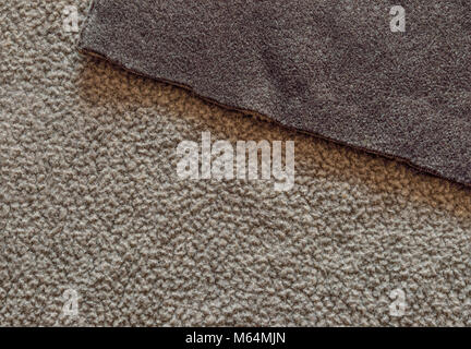 Bilateral beige and brown polar fleece fabric texture close up as background Stock Photo