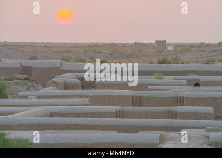 Sunset over restored walls of Gonur Depe, Turkmenistan, Huge site used by Bronze Age people 2500 bc Stock Photo