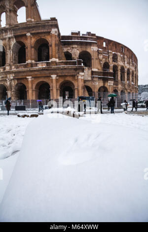 A lovely day of snow in Rome, Italy, 26th February 2018: a beautiful view of Colosseum under the snow Stock Photo