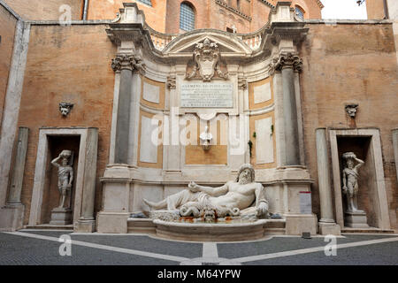 Italy, Rome, Capitoline Museums, Musei Capitolini, Palazzo Nuovo, courtyard, Marforio (Marphurius) roman statue and baroque fountain Stock Photo