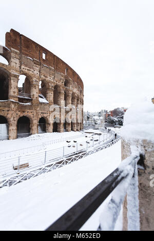 A lovely day of snow in Rome, Italy, 26th February 2018: a beautiful view of Colosseum under the snow Stock Photo