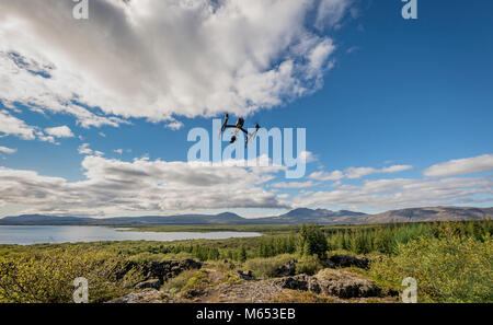 Drone taking pictures at Thingvellir National Park, a Unesco World Heritage Site, Iceland. Stock Photo