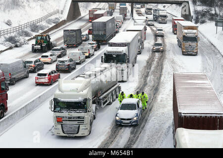 The scene on the M80 Haggs in Glasgow, as the highest level of weather warning has been issued for Scotland and Ireland as forecasters warn of blizzard-like conditions. Stock Photo